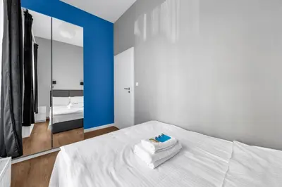 Łóżko lub łóżka w pokoju w obiekcie Goleszowska Superior Apartment by BookingHost