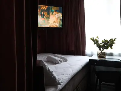 Telewizja i/lub zestaw kina domowego w obiekcie Żurawia Mini Apartments by Sofija