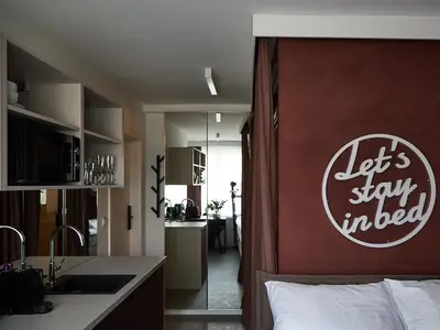 Łóżko lub łóżka w pokoju w obiekcie Żurawia Mini Apartments by Sofija