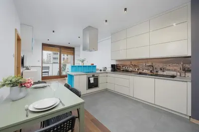 Kuchnia lub aneks kuchenny w obiekcie Ordona Modern Apartment by Solarento