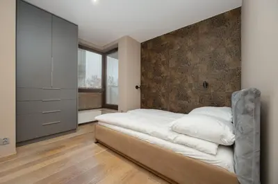 Łóżko lub łóżka w pokoju w obiekcie Ordona Modern Apartment by Solarento