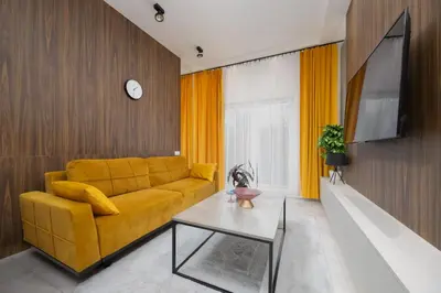 Telewizja i/lub zestaw kina domowego w obiekcie Bliska Residence by Solarento