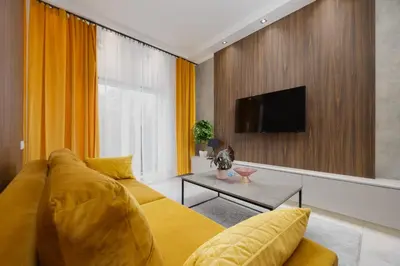 Telewizja i/lub zestaw kina domowego w obiekcie Bliska Residence by Solarento