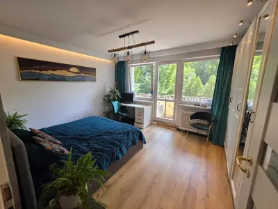 Łóżko lub łóżka w pokoju w obiekcie Deluxe Apartment with 2 Bedrooms and fireplace - PERFECT LOCATION - QUIET-NEW