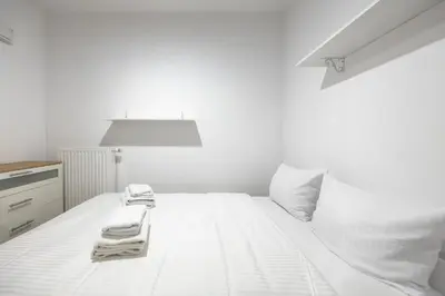 Łóżko lub łóżka w pokoju w obiekcie Marywilska Comfort Apartment by BookingHost