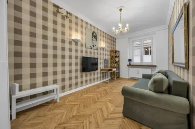 Telewizja i/lub zestaw kina domowego w obiekcie Warsaw Heartline Apartment by BookingHost