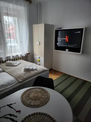 Łóżko lub łóżka w pokoju w obiekcie Apartament Plac Mirowski Centrum