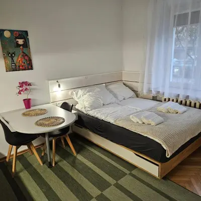 Łóżko lub łóżka w pokoju w obiekcie Apartament Plac Mirowski Centrum