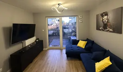Telewizja i/lub zestaw kina domowego w obiekcie CityLine Apartment Nova Ochota