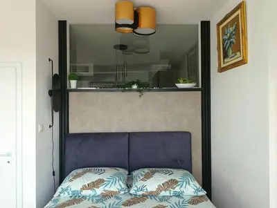 Łóżko lub łóżka w pokoju w obiekcie Bliska Wola Towers 2 bedrooms apartment