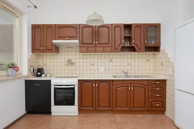 Kuchnia lub aneks kuchenny w obiekcie Pool & Cozy Apartment Warszawa Bukowińska by Solarento