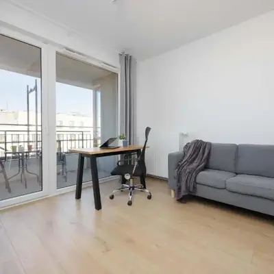 Warsaw Elegant Apartment with Parking and Balcony by Noclegi Renters