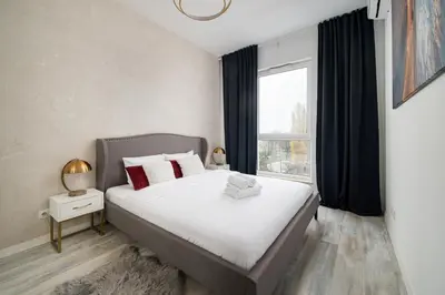 Łóżko lub łóżka w pokoju w obiekcie Pieskowa Skała 13 Residence Apartment by BookingHost