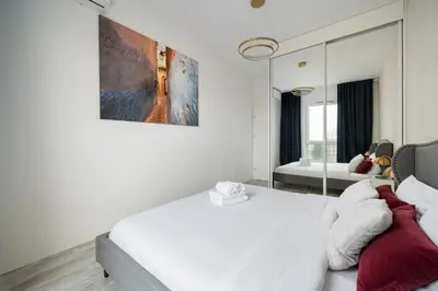 Łóżko lub łóżka w pokoju w obiekcie Pieskowa Skała 13 Residence Apartment by BookingHost