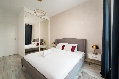 Łóżko lub łóżka w pokoju w obiekcie Pieskowa Skała 13 Residence Apartment by BookingHost