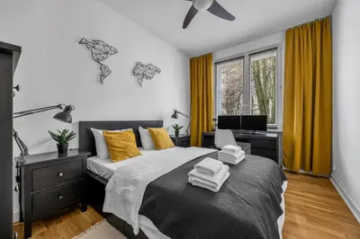 Łóżko lub łóżka w pokoju w obiekcie Bachmacka Modern Chic Apartment by BookingHost