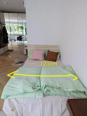 Łóżko lub łóżka w pokoju w obiekcie Stare mieszkanie na Rakietników