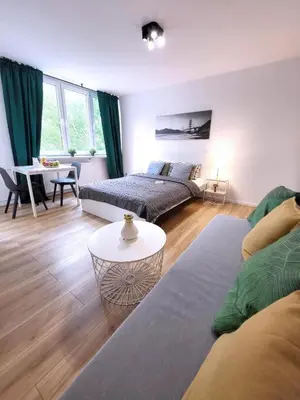 Łóżko lub łóżka w pokoju w obiekcie Top CityCenter Modern Nowogrodzka