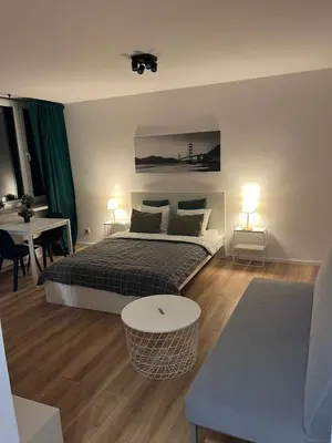 Łóżko lub łóżka w pokoju w obiekcie Top CityCenter Modern Nowogrodzka