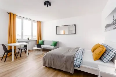 Łóżko lub łóżka w pokoju w obiekcie Top CityCenter Stylish Nowogrodzka