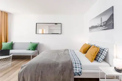 Łóżko lub łóżka w pokoju w obiekcie Top CityCenter Stylish Nowogrodzka