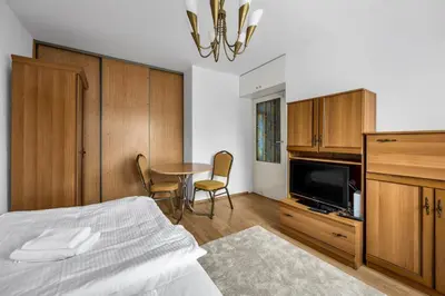 Łóżko lub łóżka w pokoju w obiekcie Bielany Standard Apartment by BookingHost