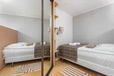 Łóżko lub łóżka w pokoju w obiekcie Nowoursynowska 145F by Homeprime