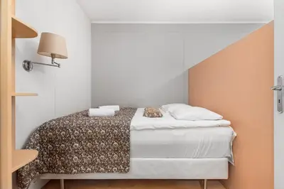 Łóżko lub łóżka w pokoju w obiekcie Nowoursynowska 145F by Homeprime