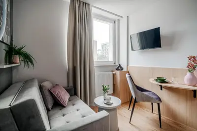 Telewizja i/lub zestaw kina domowego w obiekcie CityView Apartments by Arrenda