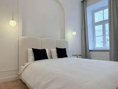 Łóżko lub łóżka w pokoju w obiekcie Luxury Residence Prime Location Parking