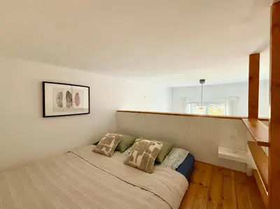 Łóżko lub łóżka w pokoju w obiekcie Cozy Stay Bracka Apartment