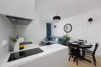 Kuchnia lub aneks kuchenny w obiekcie Ochota Bright Studio for 4 Close to Och Teatr by Noclegi Renters