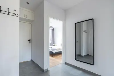 Łóżko lub łóżka w pokoju w obiekcie Cosy Family Apartment by VAYA STAYS