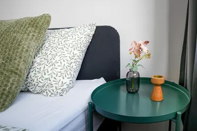 Łóżko lub łóżka w pokoju w obiekcie Cosy Family Apartment by VAYA STAYS
