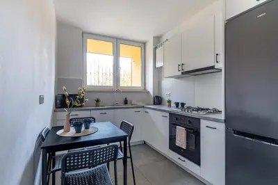 Kuchnia lub aneks kuchenny w obiekcie Cosy Family Apartment by VAYA STAYS
