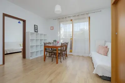 Łóżko lub łóżka w pokoju w obiekcie Obywatelska Comfort Apartment by Solarento