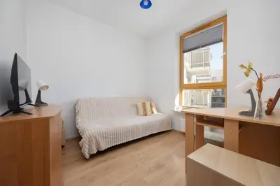 Telewizja i/lub zestaw kina domowego w obiekcie Obywatelska Comfort Apartment by Solarento