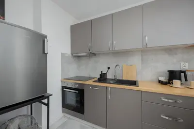 Kuchnia lub aneks kuchenny w obiekcie Smocza Bright & Cozy Apartment by Solarento