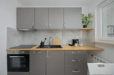 Kuchnia lub aneks kuchenny w obiekcie Smocza Bright & Cozy Apartment by Solarento