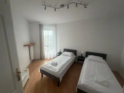 Łóżko lub łóżka w pokoju w obiekcie Metro Kondratowicza Apartment Malborska Targówek Warsaw