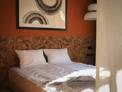 Łóżko lub łóżka w pokoju w obiekcie Enjoy Warsaw - home cinema