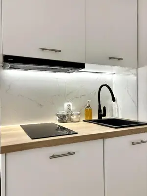 Kuchnia lub aneks kuchenny w obiekcie Smart - Modern Mokotów Studio