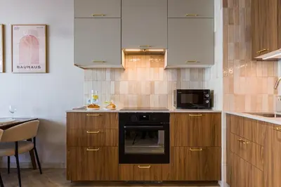 Kuchnia lub aneks kuchenny w obiekcie Soho Serenity Warszawa