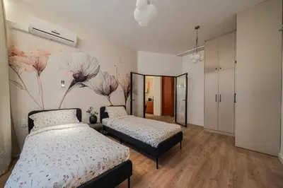 Łóżko lub łóżka w pokoju w obiekcie Złota 7 Apartment