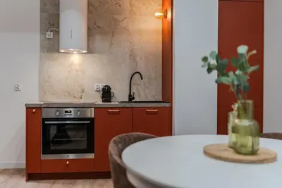 Kuchnia lub aneks kuchenny w obiekcie Złota 7 Apartment