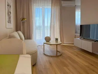 Telewizja i/lub zestaw kina domowego w obiekcie Nowoczesny NEXT Ursus Apartment, Parking, Wi-Fi