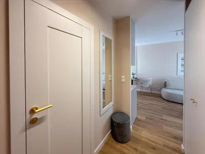 Łóżko lub łóżka w pokoju w obiekcie Nowoczesny NEXT Ursus Apartment, Parking, Wi-Fi
