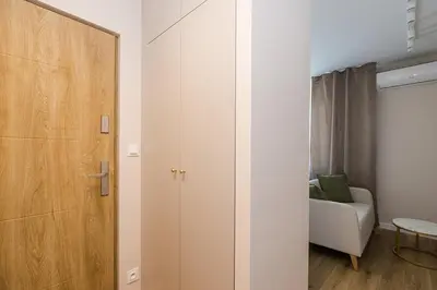 Łóżko lub łóżka w pokoju w obiekcie Komfortowy Apartament NEXT Ursus - Parking - Szybkie Wi-Fi
