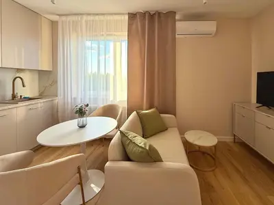 Telewizja i/lub zestaw kina domowego w obiekcie Komfortowy Apartament NEXT Ursus - Parking - Szybkie Wi-Fi