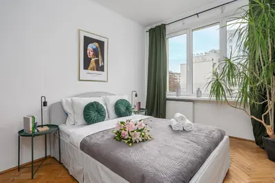 Łóżko lub łóżka w pokoju w obiekcie Lumina 3 room apart near Łazienki Królewskie